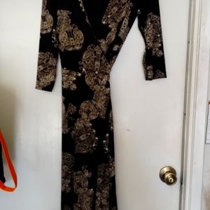 Black and gold wrap around dress